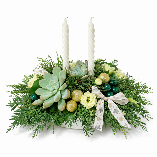 Centre de table avec succulentes et bougies blanches
