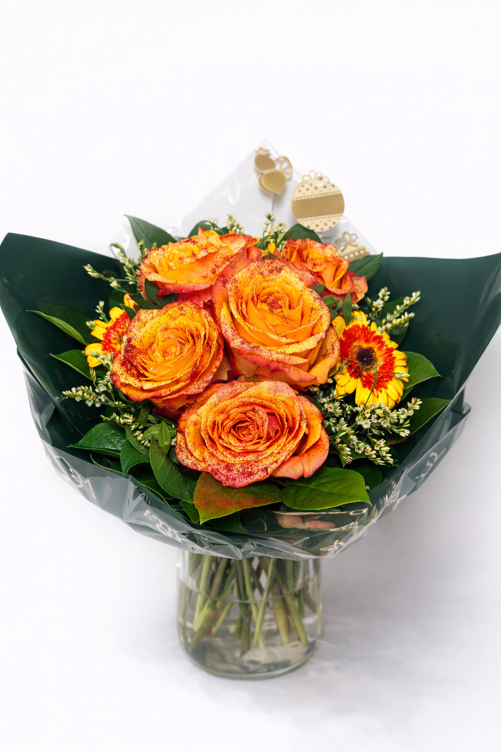 Bouquet de roses orangées scintillantes – Composition florale élégante